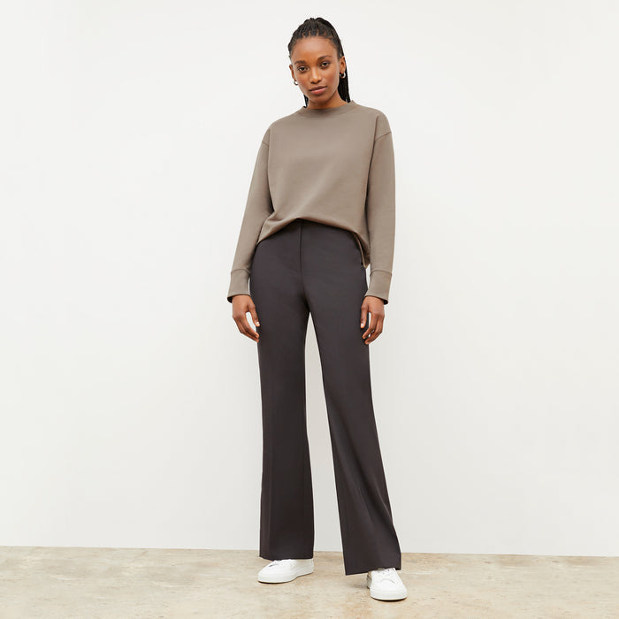 Front image of a woman wearing the Ellie Pullover - Light French Terry in Light Truffle