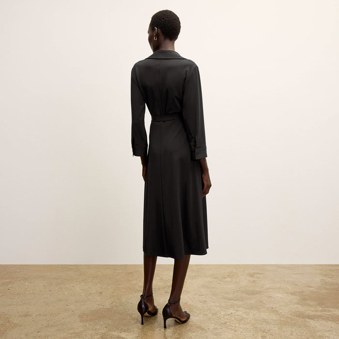 back image of a woman wearing the emmett dress in black
