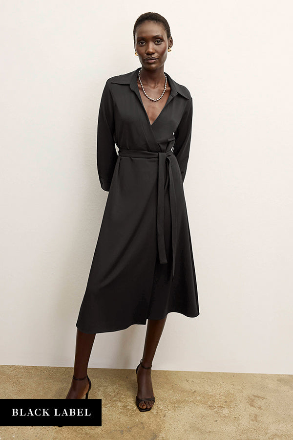 front image of a woman wearing the emmett dress in black | Exclude | Grid
