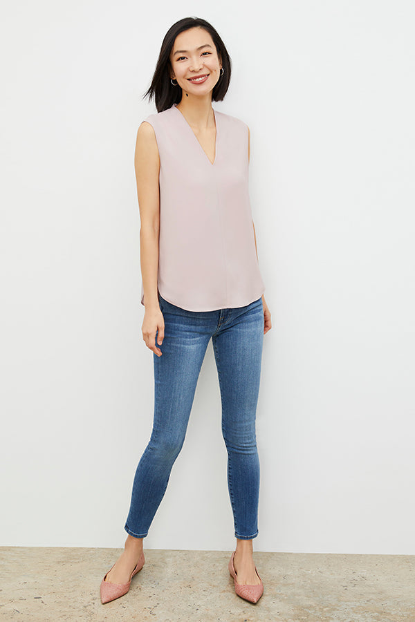 Image of a woman wearing the Emmy top in Blossom | Grid | Exclude