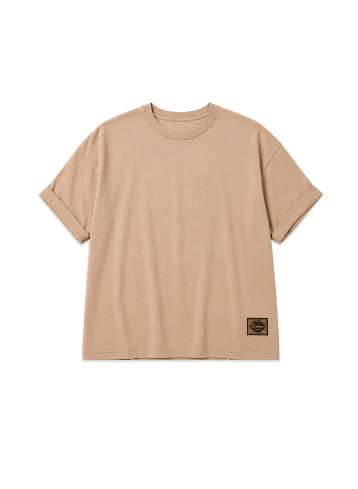 Japanese Made Essential Cotton T-shirt in sand color, featuring a relaxed silhouette and a woven label at the hem.