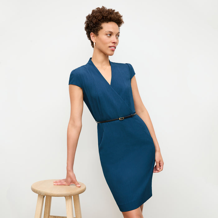 front image of a woman wearing the felisa dress in deep teal | Lead