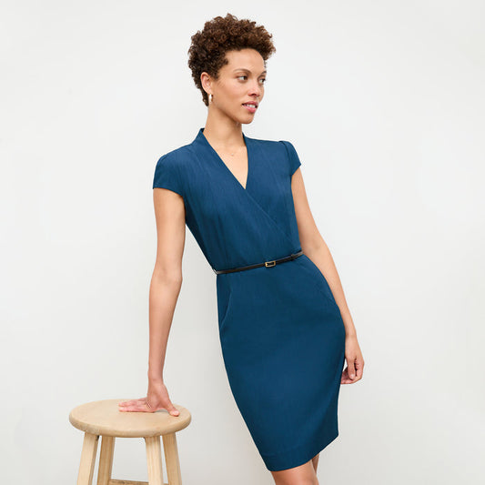 front image of a woman wearing the felisa dress in deep teal | Lead
