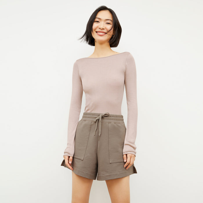 Front image of a woman wearing the Felix Short - Light French Terry in Light Truffle | Lead