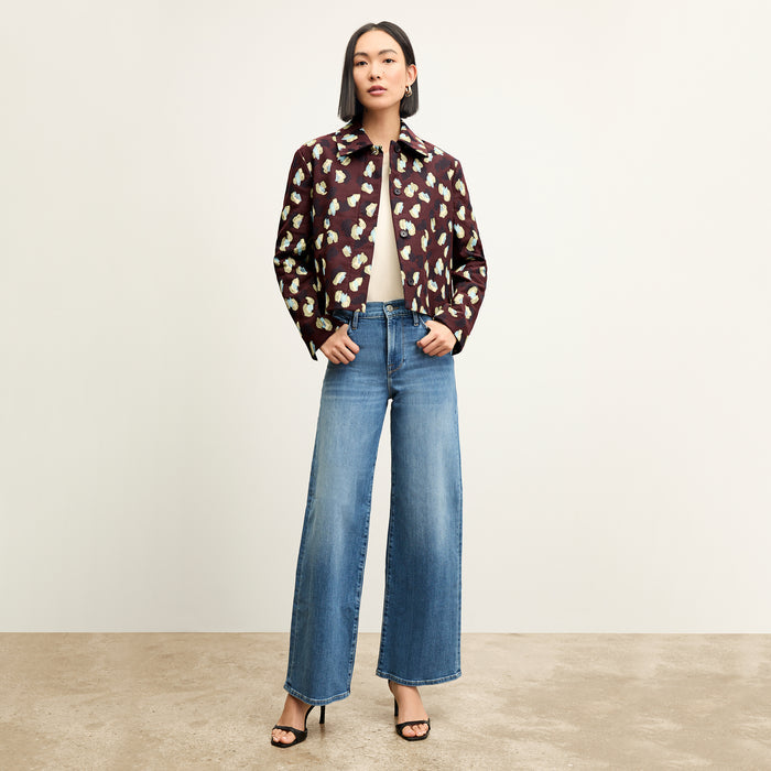 front image of a woman wearing the FRAME le slim palazzo jeans in drizzle