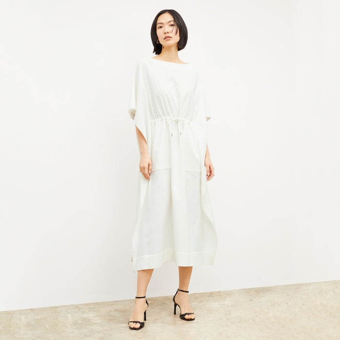 Front image of a woman wearing the Freedlund Caftan in Ivory | Lead