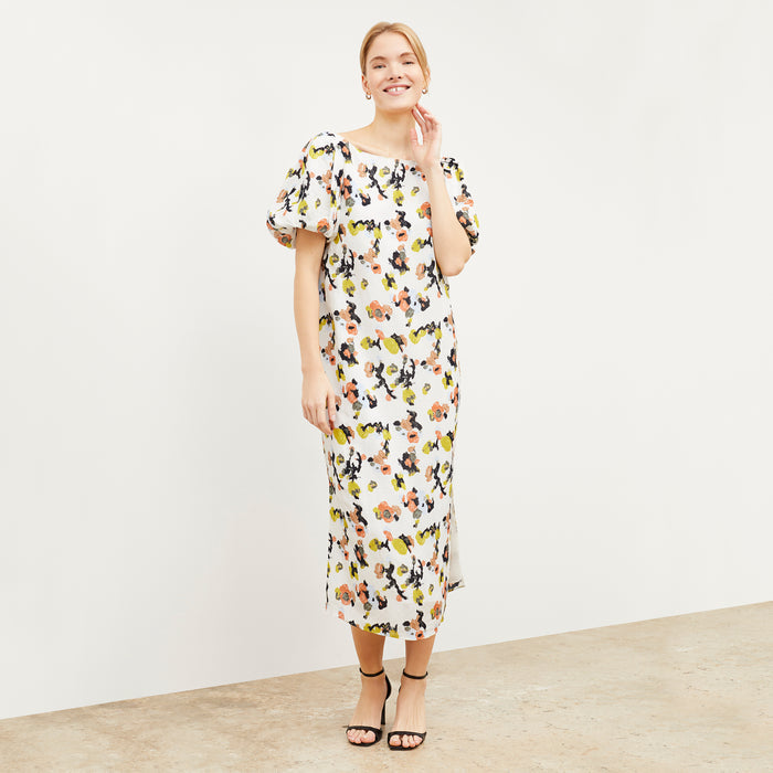 Front image of a woman wearing the Gali dress in meadow print linen | Lead