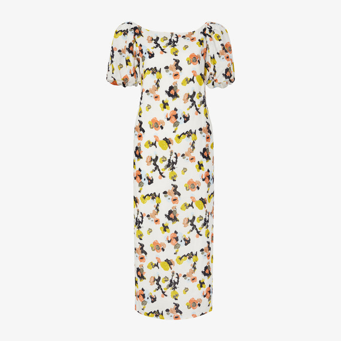 Front image of a woman wearing the Gali dress in meadow print linen