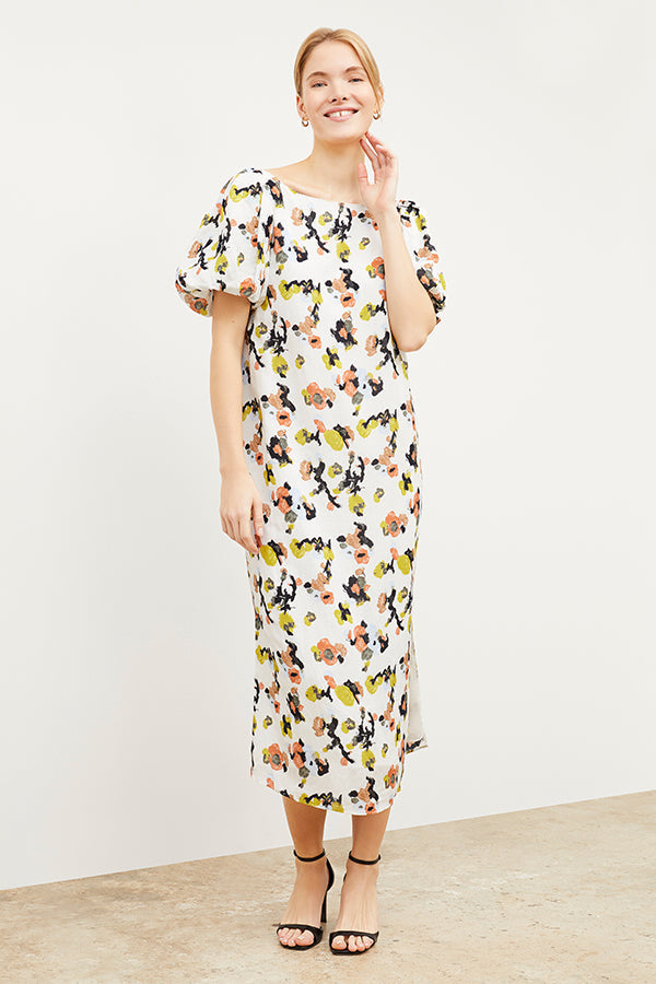Front image of a woman wearing the Gali dress in meadow print linen | Exclude | Grid