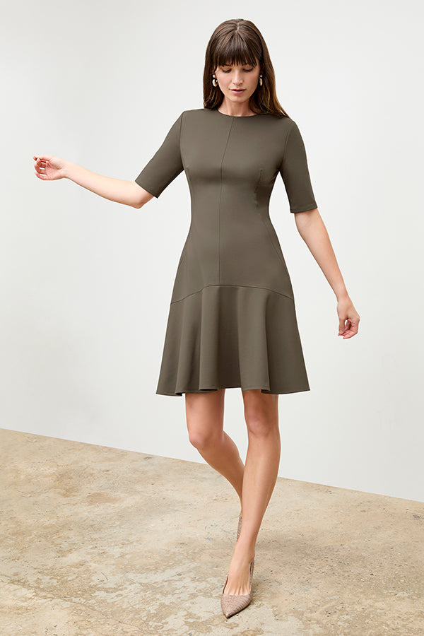front image of a woman wearing the gina dress in ash | Exclude | Grid
