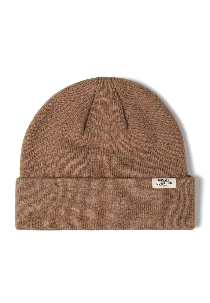 Detail of a ribbed beanie hat in brown with a fold-up cuff and a small logo badge.