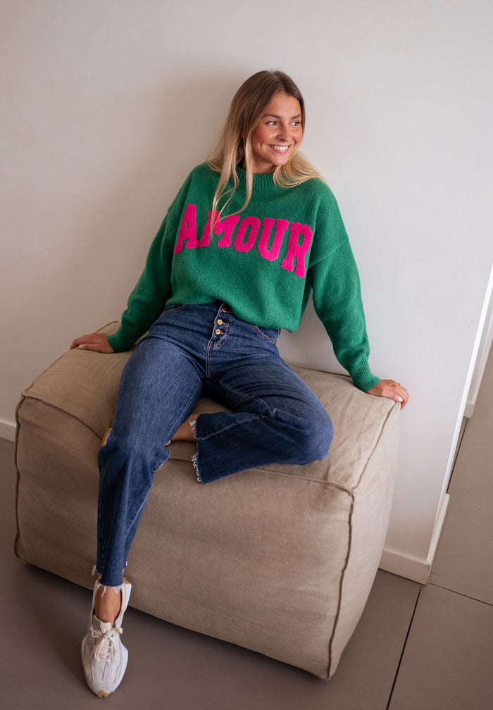 Green AMOUR logo sweater side view