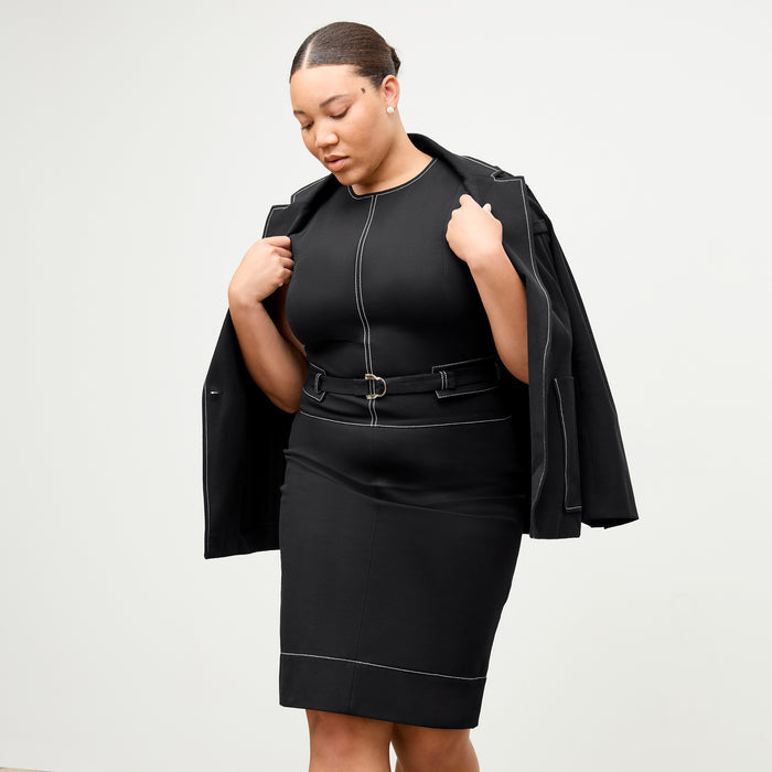 front image of a woman wearing the grenville jacket in black