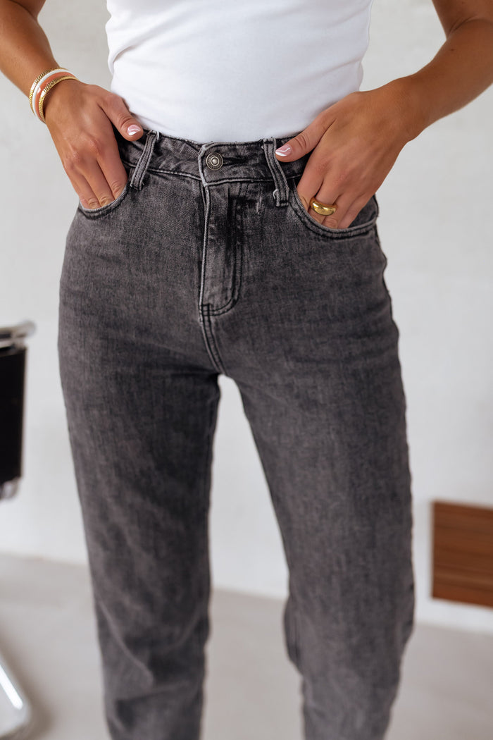 Grey jeans with belt loops and pockets