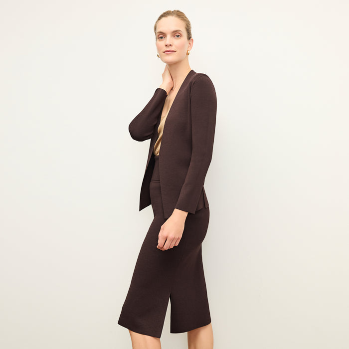 side image of a woman wearing the Harlem Skirt in Chocolate | Lead