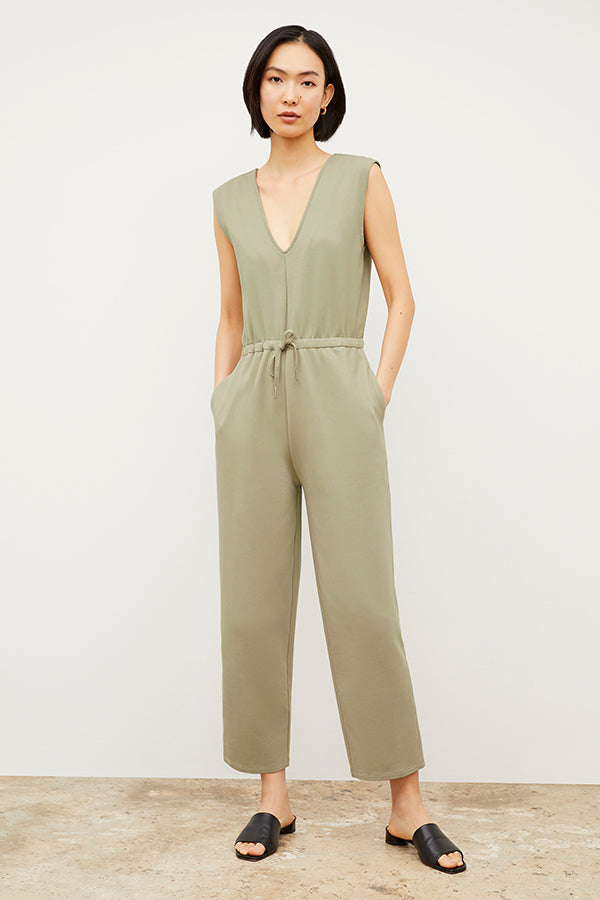 Front image of a woman wearing the Janet Jumpsuit - Light French Terry in Laurel Green | Grid | Exclude