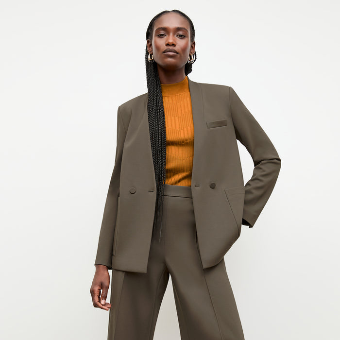 front image of a woman wearing the janette jacket in ash | Lead