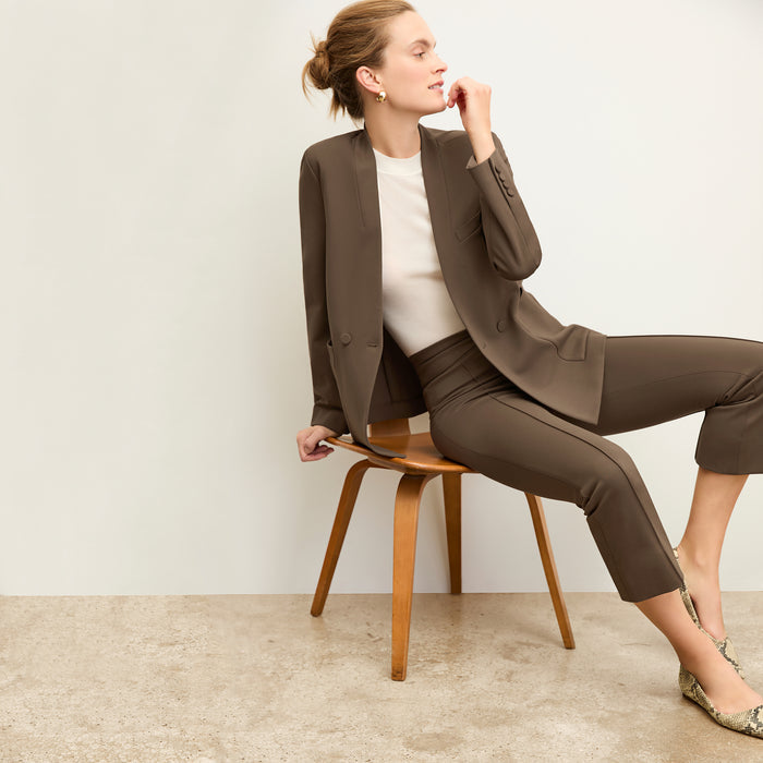 front image of a woman wearing the janette jacket in ash