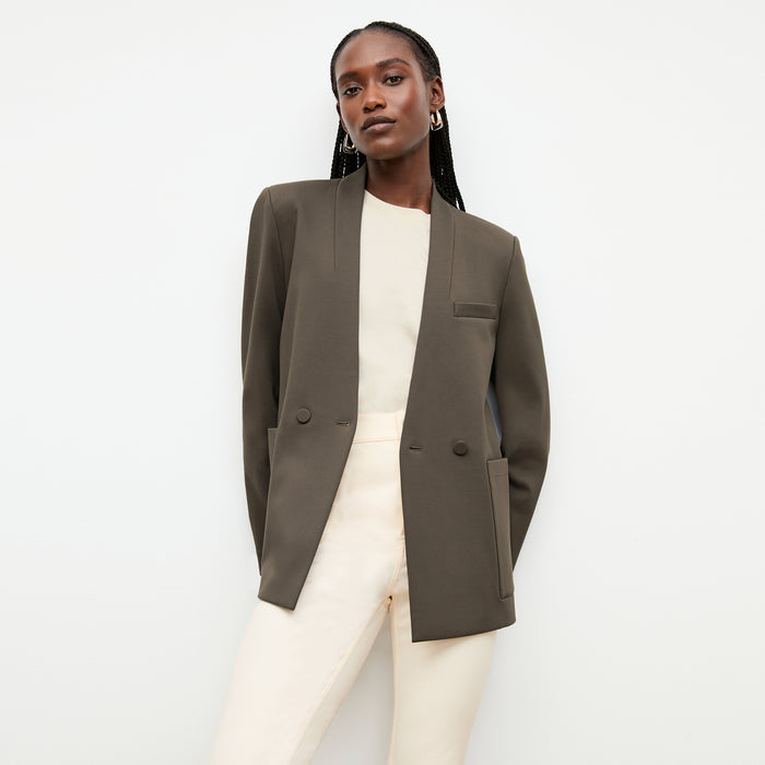 front image of a woman wearing the janette jacket in ash