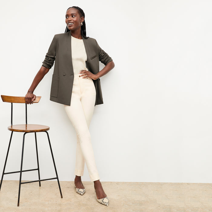 front image of a woman wearing the janette jacket in ash