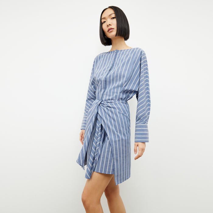 front image of a woman wearing the janie dress in poplin stripe