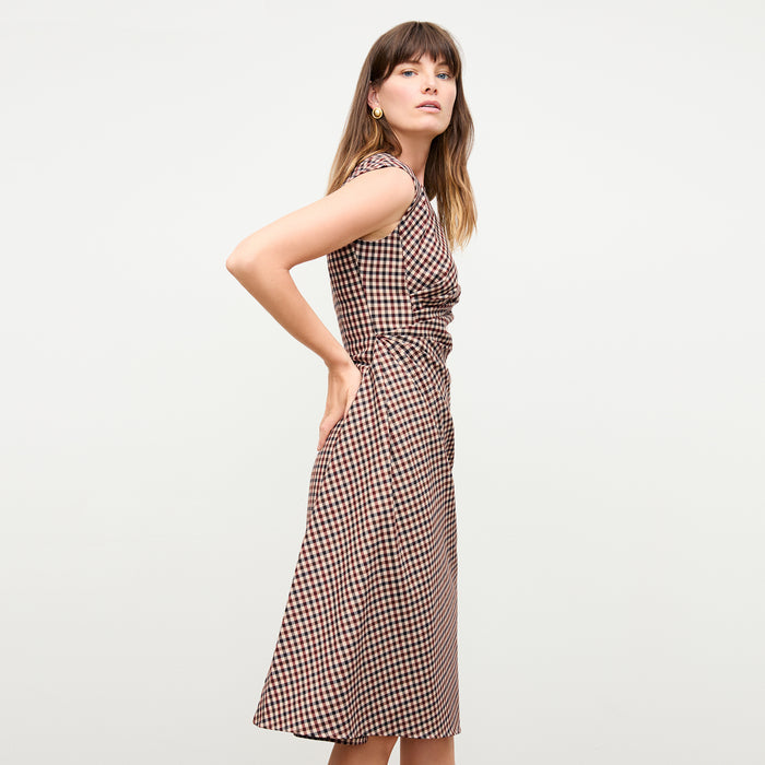 side image of a woman wearing the jeannine dress in windowpane sharkskin