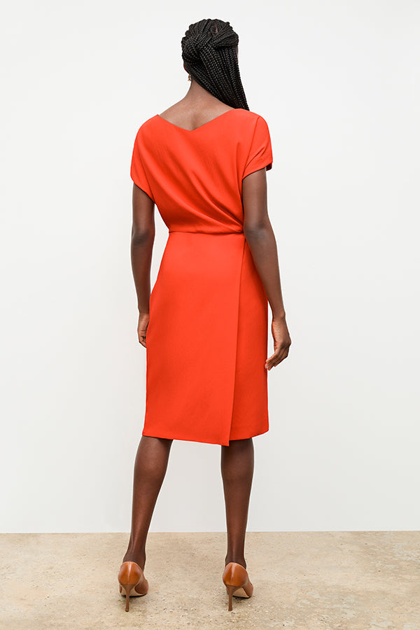 back image of a woman wearing the jillian dress in bright coral | Exclude | Grid Hover