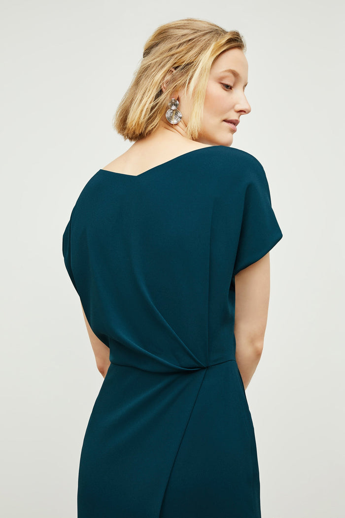 Detail image of a woman standing wearing the Jillian Dress in Rainforest | Grid Hover | Exclude