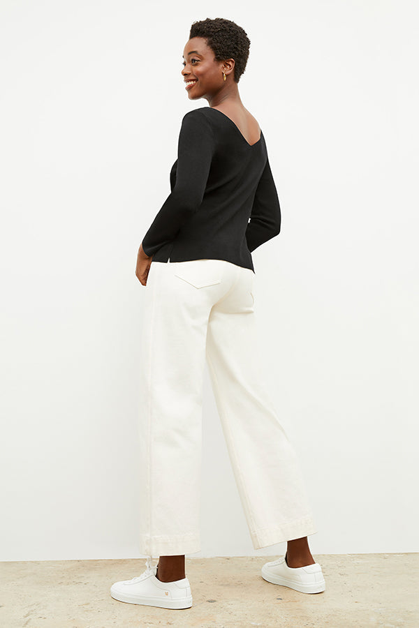 back image of a woman wearing the kara top in black | Exclude | Grid Hover