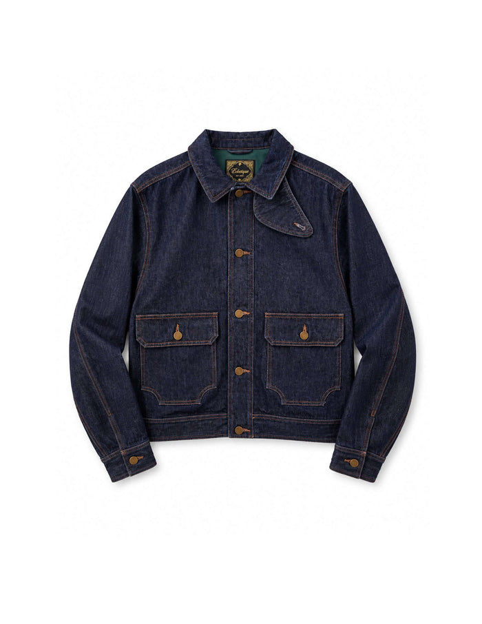 Kura Indigo Jacket featuring a cropped design with indigo wash, brass buttons, and distinct throat latch detail.