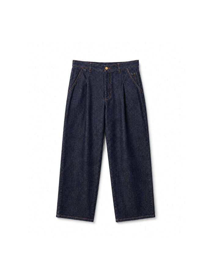 Kura Indigo Jeans in a relaxed wide-leg shape with front pleats and angled pockets, made from raw indigo denim.