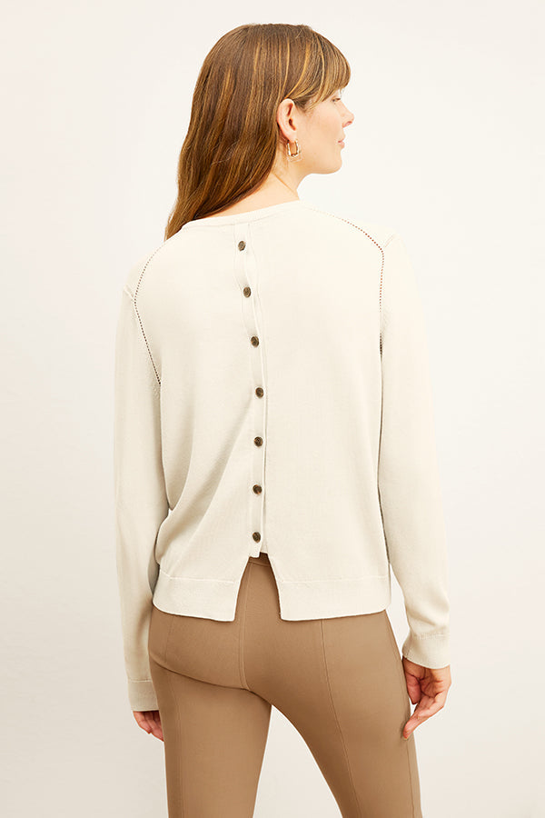 front image of a woman wearing the larissa sweater in ivory | Exclude