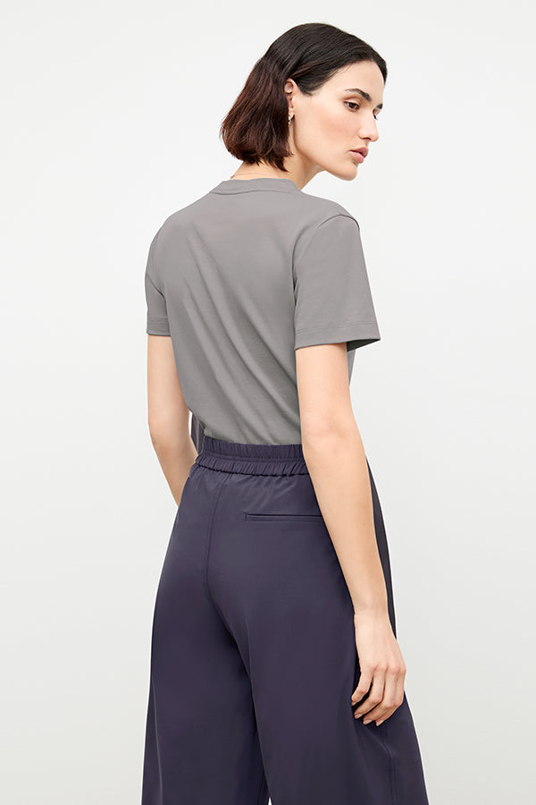 front image of a woman wearing the lee t-shirt in thistle | Exclude