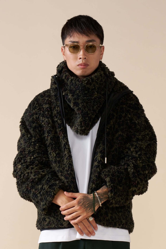 Model wearing Éclectique leopard fleece balaclava and jacket
