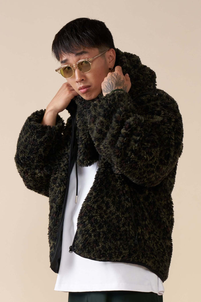 Éclectique leopard fleece balaclava styled in winter outfit on model