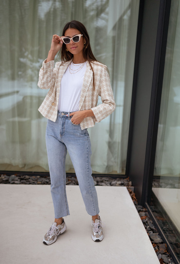 Model wearing light blue Hunter straight-leg jeans
