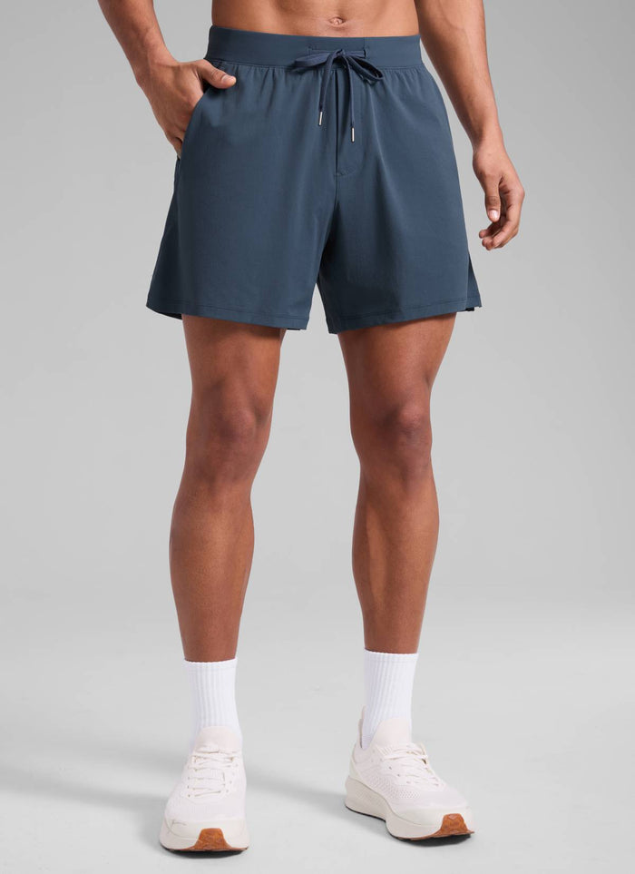 CRZ YOGA Men's Quick Dry Lightweight Gym Shorts with Zipper Pocket Stelindigo