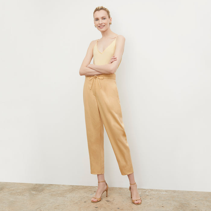 Front image of a woman wearing the Lisey Cami - Washable Silk in Parchment