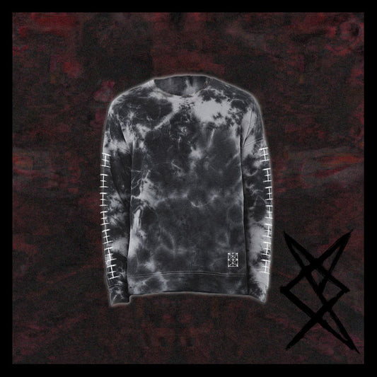 A Nemertines black and gray tie-dyed sweatshirt with white tally marks on the sleeves, a bold angular black symbol at the hem, and a relaxed fit, shown against a dark marbled background.