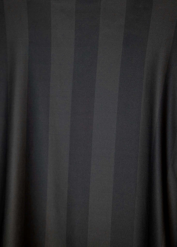Long Sleeve Soccer Jersey featuring tonal striped fabric design in black.