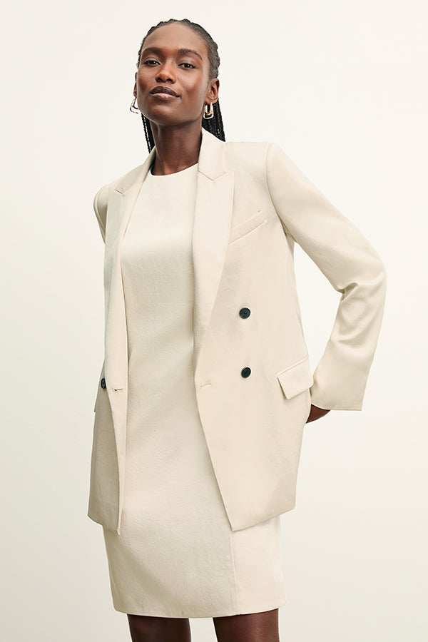 front image of a woman wearing the maaza dress in champagne | Exclude | Grid Hover
