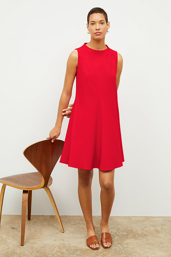 Front image of a woman wearing the malala dress in flame | Exclude | Grid