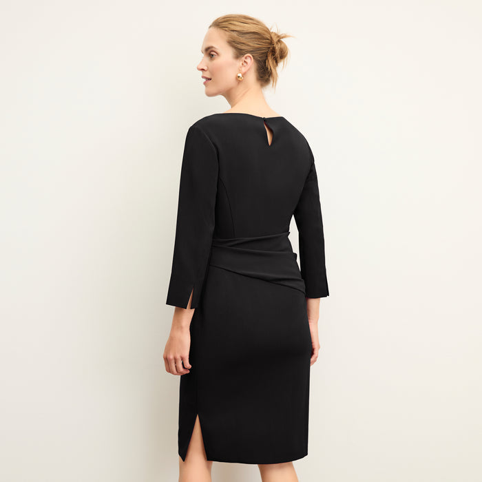 back image of a woman wearing the maxine dress in black