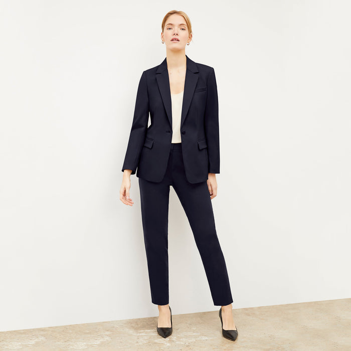 Front image of a woman wearing the Mejia pant in Galaxy Blue | Lead