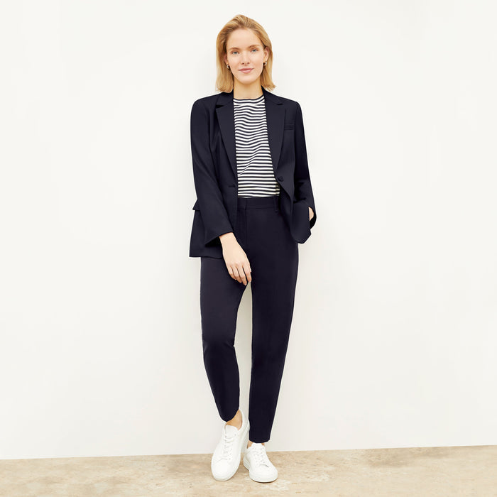 Front image of a woman wearing the Mejia pant in Galaxy Blue