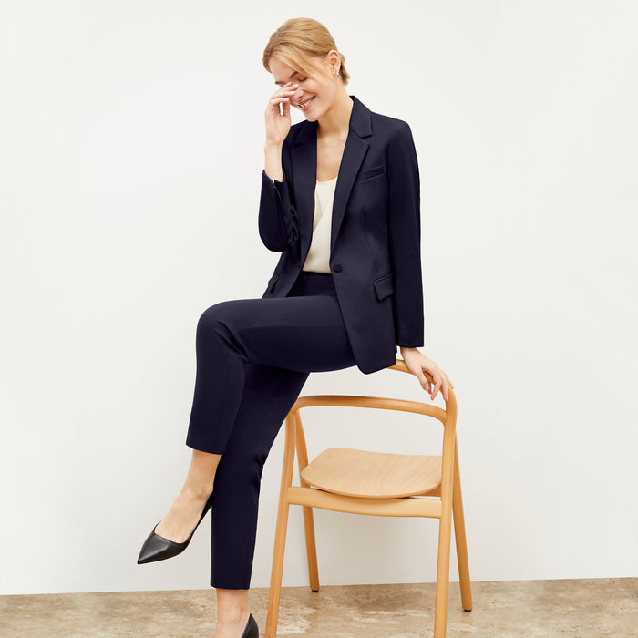 Front image of a woman wearing the Mejia pant in Galaxy Blue