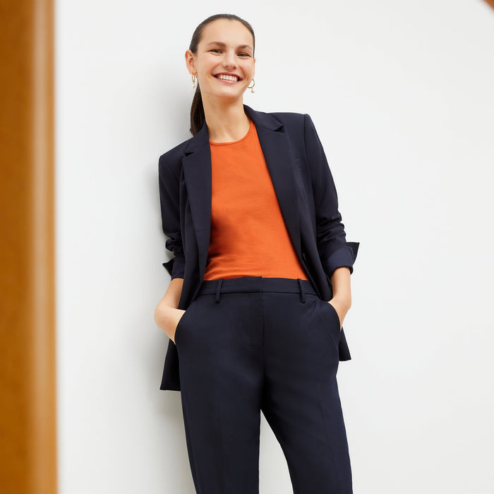 Front image of a woman wearing the Mejia pant in Galaxy Blue