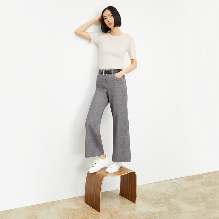 front image of a woman wearing the milo pant in gingham linen