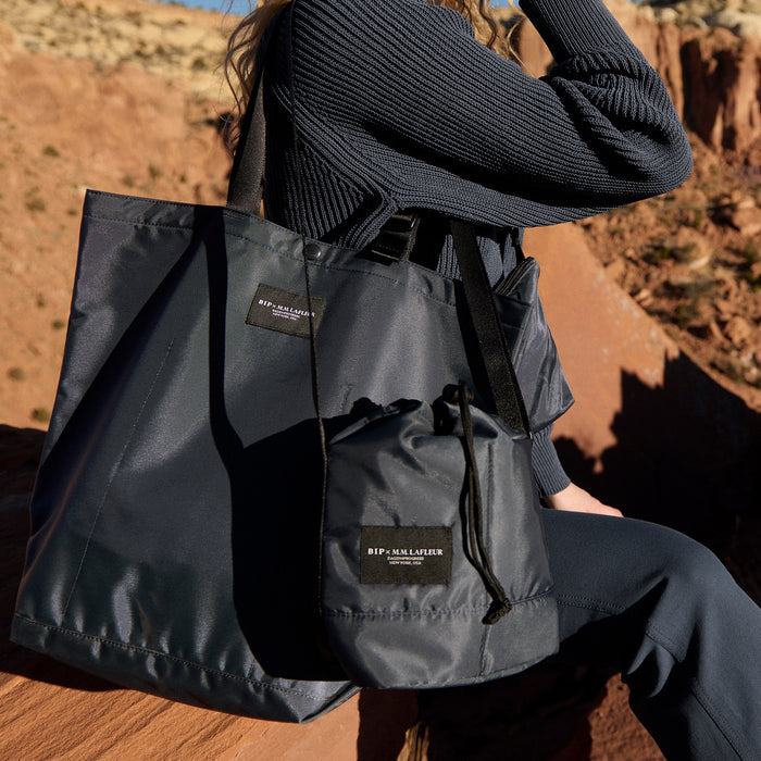 front image of the Bags in Progress x MM Padded Mini Bucket Bag in Navy
