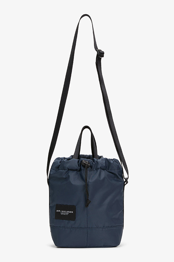 Packshot image of the Bags in Progress x MM Padded Mini Bucket Bag in Navy | Grid | Exclude | Still